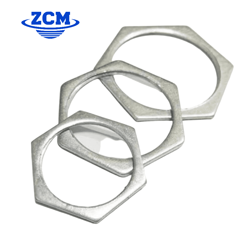 Two large thin hex nuts overlapping showing flat profile by ZCM